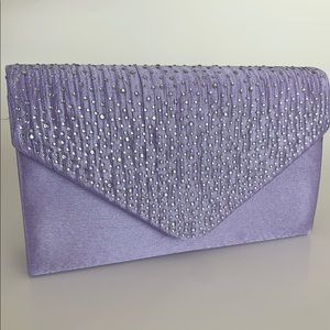 Purple rhinestone clutch